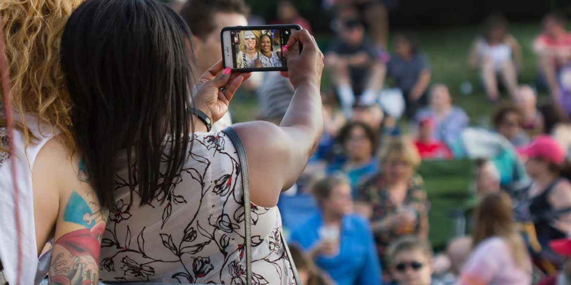 Getting a selfie with a fan at the Herndon Festival.